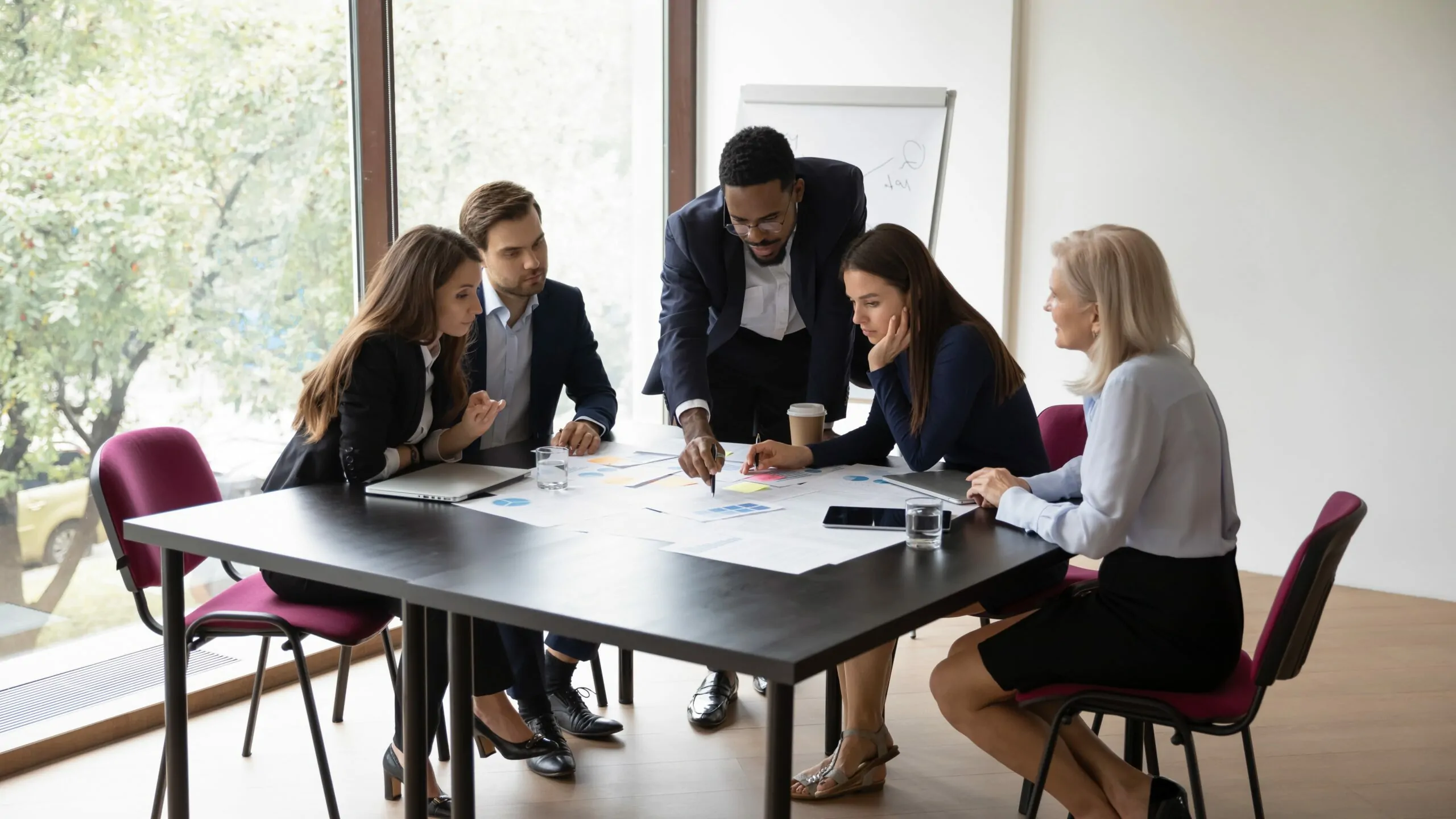 A group of professionals around a table